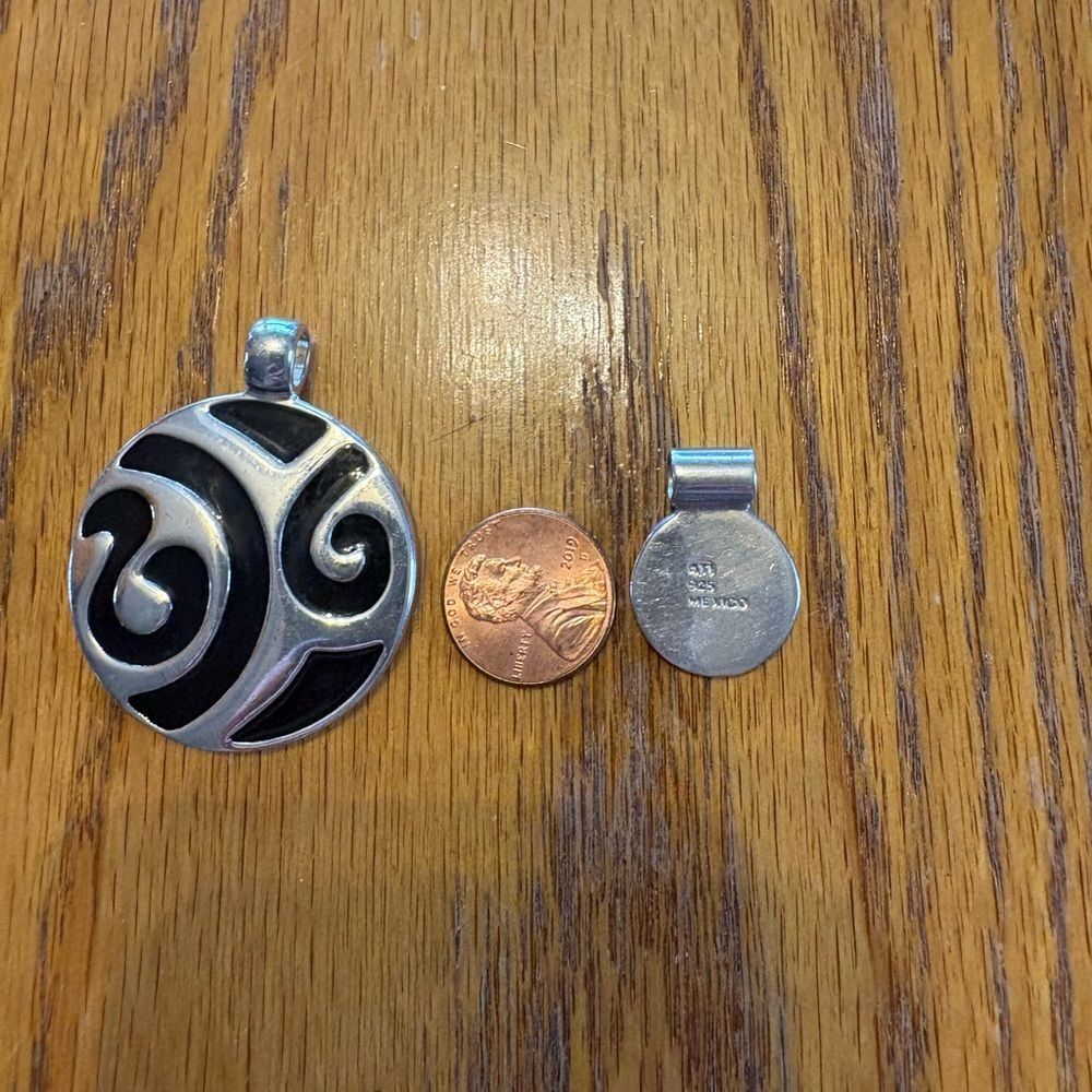 Black Enamel Swirl Pendant and Sterling silver pendant